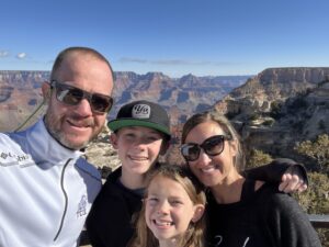 Family taking a selfie on vacation.