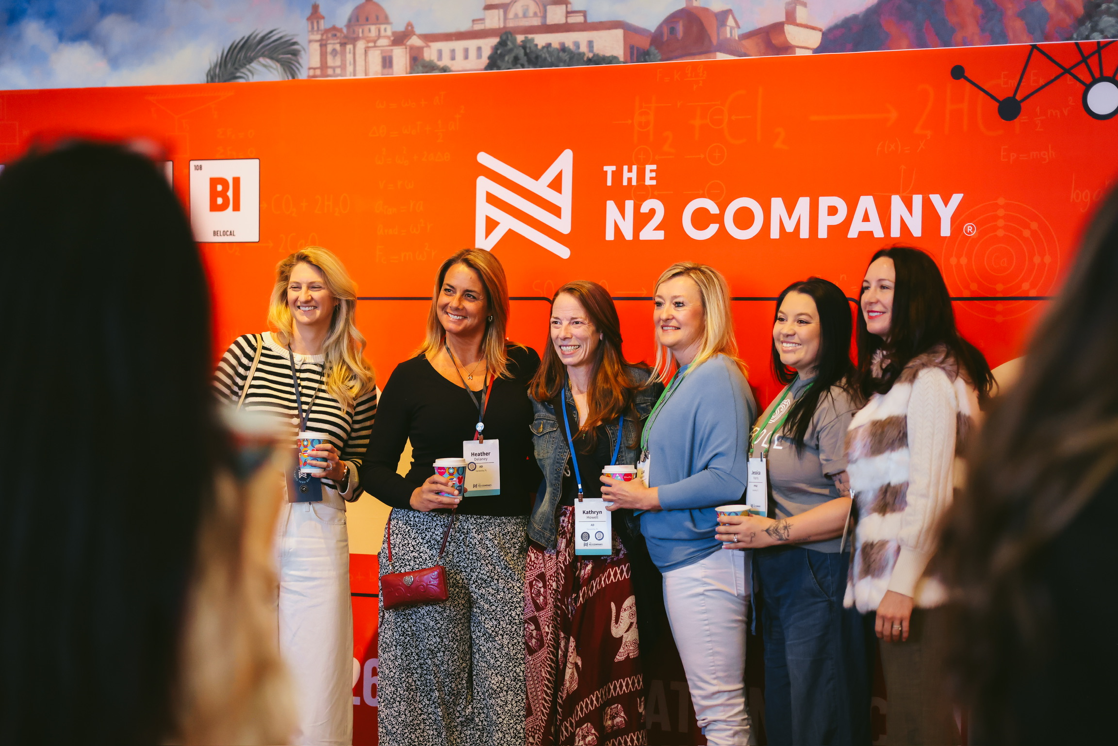 Group of N2 Company entrepreneurs posing together at an annual conference